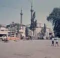 The clock tower was damaged and demolished after the earthquake. The photo belongs to the days of Saathane Square without a tower.
