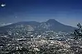 The massive compound San Salvador (volcano) dominates the landscape west of El Salvador's capital city of San Salvador.