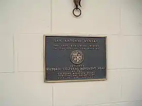 Plaque on the outside of the tourist shop and restaurant at the San Antonio Winery.