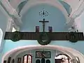 View of the back of the interior of the church where the organ used to be