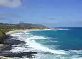 Sandy Beach from the Hālona Blowhole lookout.  The far distant ridge is Makapuʻu Head, the eastern end of Oʻahu