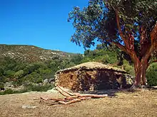 A pagliaghju structure in the eastern Agriates Desert.