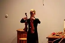 Caswell with her violin and Hardanger d'amore