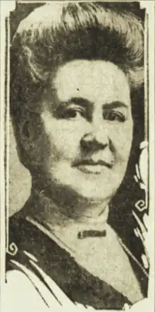 Portrait photo of middle-aged white woman.