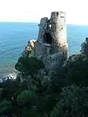 The Devil's tower, also known in Sardinia as "Sa Turri e Su Scolliu", rises on the headland of Punta Zavorra.