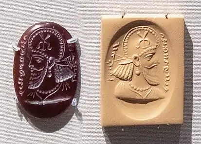 Sasanian seal with portrait of an official wearing the kulāf, inscription in Pahlavi "Perozhormizd, son of the Kanarang". 5th century CE, British Museum, 134847.