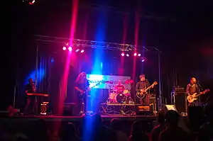 Kiesbye (second from the left) performing live with his band Sator.