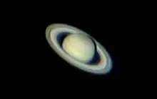 Saturn image using negative projection (Barlow lens) with a webcam attached to a 250mm Newtonian telescope. It is a Composite image made from 10% of the best exposures out of 1200 images.