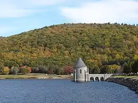 The Saville Dam impounds the East Branch Farmington River to form Barkhamsted Reservoir.