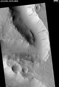 Scamander Vallis. Dark Slope Streaks may be seen in the image. The darker the streak, the younger it is.