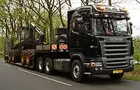 Scania R 500 LA6x2HHA tractor unit with pre-2009 styling in the Netherlands.