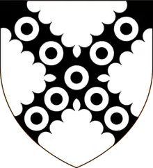 Argent on a saltire engrailed sable nine annulets of the field (Earl of Scarsdale)