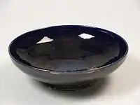 Bowl covered with monochrome deep blue to black enamel, 1955–61