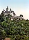 Image 13Coloured black and white photograph: the Burgberg with Wernigerode Castle (between 1890 and 1905) (from List of mountains and hills of the Harz)