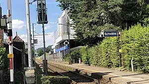 Low platform next to single-track railway line