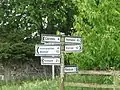 Finger sign at approach to Town and Kirk Yetholm villages (May 2018).