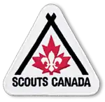 The Scout fleur-de-lis and the maple leaf of the flag of Canada with two sticks to create a stylized tent or campfire in a stylized badge