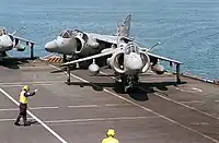 Royal Navy Sea Harrier FA2s of 801 Naval Air Squadron on the deck of HMS Illustrious in the Persian Gulf
