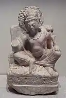 Seated Avalokiteshvara, white marble, Khair Khaneh, 6th-7th century CE. Musée Guimet MA 8151.