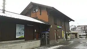 Two-story building with gabled roof