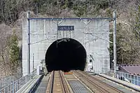 Entrance to the tunnel from Honshu side. The dual gauge tracks are visible