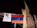 Portrait of Serhiy Nigoyan with flags of Armenia and Ukraine at barricade No. 32 in Independence square, Kyiv, Ukraine.