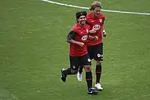 Teammates Sergio Agüero and Diego Forlán training at the Emirates Stadium side by side.