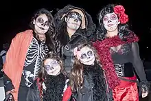 People photographed in Mexico City, celebrating Day of the Dead.