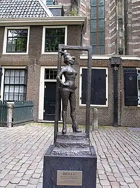 Bronze statue Belle in front of the Oude Kerk. Inscription says "Respect sex workers all over the world."