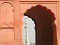 Minar-e-Pakistan richly framed by an aisle arch