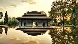 A pavilion in the middle of a pond
