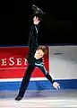 A male skater performing an arabesque spiral(Front view)(Shawn Sawyer)