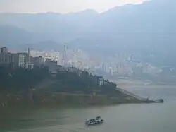 The fall of the Shennong Stream (in front) into the Yangtze