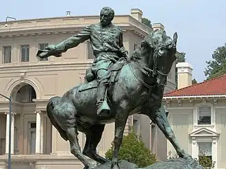 statue of Sheridan riding horse and waving hat
