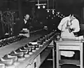 Assembly line in a French shoe factory (1948)