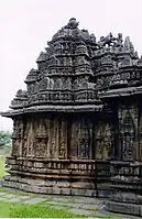 Bucesvara Temple, Koravangala from the side. Projecting sukanasa with free-standing sculpture on the top of the Hoysala emblem.