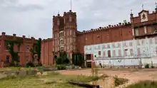 A photograph of the main Sibley Mill blading as it stood unused and empty in May 2023