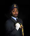A Sikh Royal Air Force officer with an officer's cap badge on a turban.