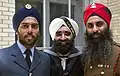 Sikh service members wearing turbans. The turban of the junior rating lacks a cap badge, as is the case with the sailor cap it replaces.