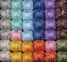 Dyed silk yarns