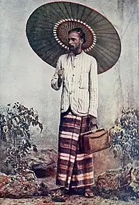 Reproduction of a hand coloured photograph of a Sinhalese man in Mumbai, 1897