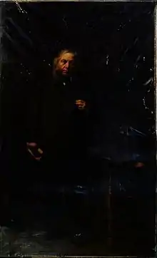 painting of Alexander Anderson, by Sir George Reid.  dark image of him standing, with a blue chair to his left.