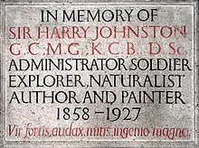 A stone memorial tablet with deeply engraved lettering