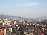 A view of Zorrotza, with Bilbao skyline in the background.