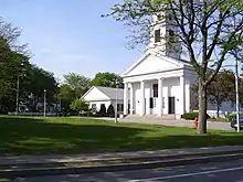 Slatersville Green in Rhode Island and the Congregational Church meeting house which the Slaters constructed and attended