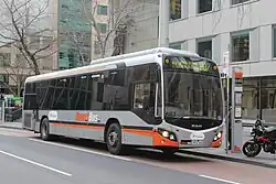 Transdev Melbourne Custom Coaches bodied MAN 18.310 on Lonsdale Street in August 2013