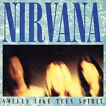 A blurred photo of the band with a thick border that has a background of water and the band's logo in large font above and the song title smaller below