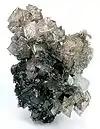 Crystals of slightly pink cobaltoan smithsonite, Tsumeb, 6.8 x 4.6 x 3.7 cm