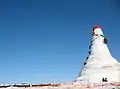 The world’s largest snowwoman or snowman, a 122 feet 1 inch (37.21 m) tall snowwoman from 2008, named Olympia in honor of Olympia Snowe