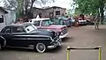 Juan Delgadillo's collection of vintage Chevrolets. Pictured l to r: 1949 Deluxe coupe, 1963 half-ton pickup, unidentified fender, 1950 half-ton pickup, 1970 Impala hardtop, 1939 one-ton fire truck